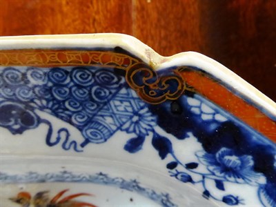 Lot 414 - A pair of 19th century Chinese export serving dishes each painted with a figure on a boat, next...
