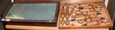 Lot 445 - * A Victorian parlour skittles game (cased) together with a tabletop bijouterie cabinet (2)