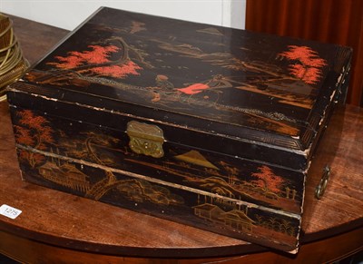 Lot 448 - An Oriental chinoiserie lacquered travelling writing slope