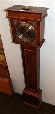 Lot 473 - A small oak veneered longcase clock