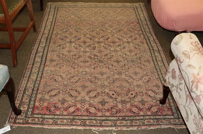 Lot 1009 - A Malayir rug, the rose pink field of Herati design, enclosed by narrow borders 185cm by 128cm
