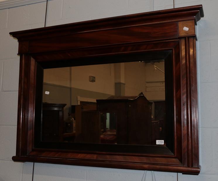 Lot 1153 - A reproduction mahogany veneered over mantle mirror