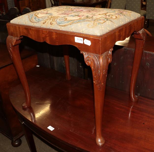 Lot 1178 - A mahogany piano stool with wool work seat cover