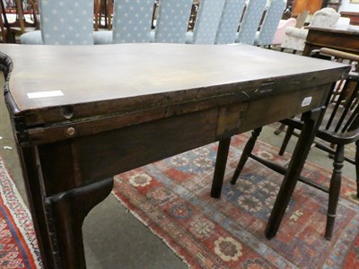 Lot 1186 - A George III mahogany serpentine front card table