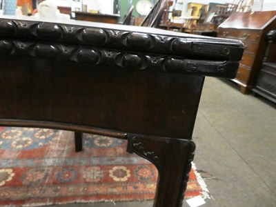 Lot 1186 - A George III mahogany serpentine front card table