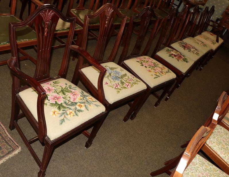 Lot 1192 - A set of six Hepplewhite style mahogany dining chairs, plus two carvers, with wool work floral...