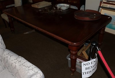 Lot 1199 - A mahogany two leaf wind out dining table