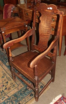 Lot 1213 - An 18th century oak panel hall chair
