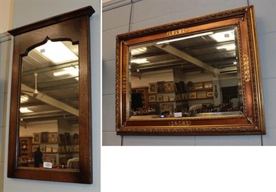 Lot 1251 - An 18th century style oak wall mirror and a gilt rectangular form wall mirror (2)