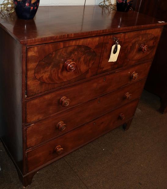Lot 1255 - An early 19th century mahogany bureau/chest of drawers