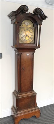 Lot 1259 - An oak thirty hour long case clock, the arched brass dial signed Taylor, Kirby, with another...