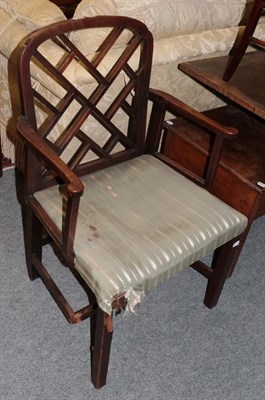 Lot 1264 - * A George III Chinese Chippendale style mahogany open armchair, lattice work back and square...