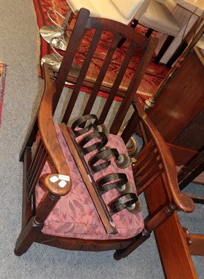 Lot 1288 - A 1920s/30s oak adjustable lounge chair and a set of five bells (2)