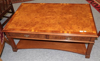 Lot 1291 - A burr walnut veneered two-drawer rectangular form coffee table