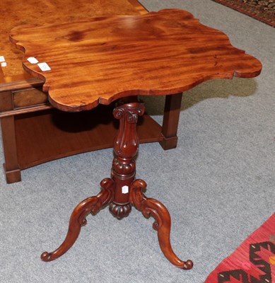 Lot 1292 - A mahogany tilt top tripod table, together with a console table (2)
