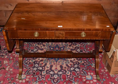 Lot 1302 - A Regency style inlaid mahogany drop-leaf sofa table, 100cm wide (closed) by 59cm deep by 73cm high