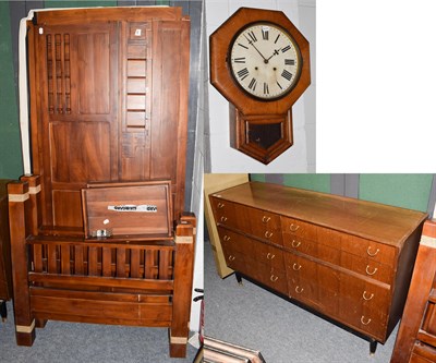 Lot 1307 - A sideboard fitted with eight drawers, a double bed frame and a single bed frame and a drop...