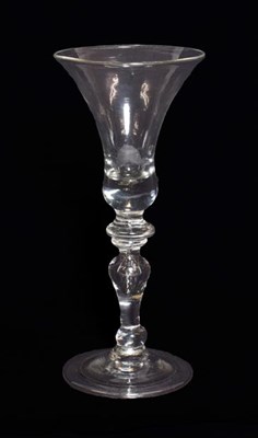 Lot 1 - A Baluster Wine Glass, circa 1740, the bell shaped bowl on an annular knop and baluster stem...
