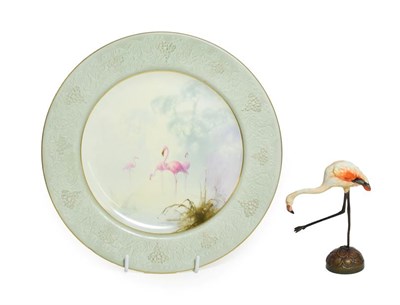 Lot 35 - A Royal Worcester Porcelain Plate, by Walter Powell, 1912, painted with flamingos in a misty...