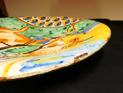 Lot 38 - A Montelupe Maiolica Dish, mid 17th century, painted in blue, ochre, green and manganese with a...