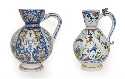 Lot 39 - A French Faience Jug, probably Rouen, dated 1736, of ovoid form with flared neck and loop...