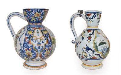 Lot 39 - A French Faience Jug, probably Rouen, dated 1736, of ovoid form with flared neck and loop...