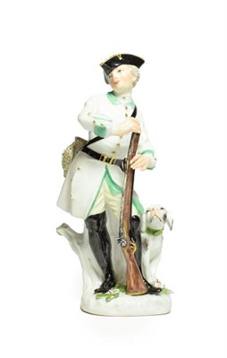 Lot 41 - A Meissen Porcelain Figure of a Huntsman, circa 1750, standing wearing a tricorn hat and green...