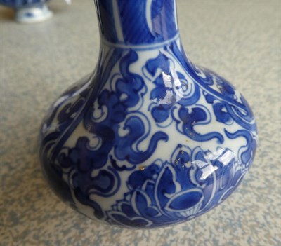 Lot 54 - A Matched Garniture of Five Chinese Porcelain Bottle Vases, Kangxi, painted in underglaze blue with