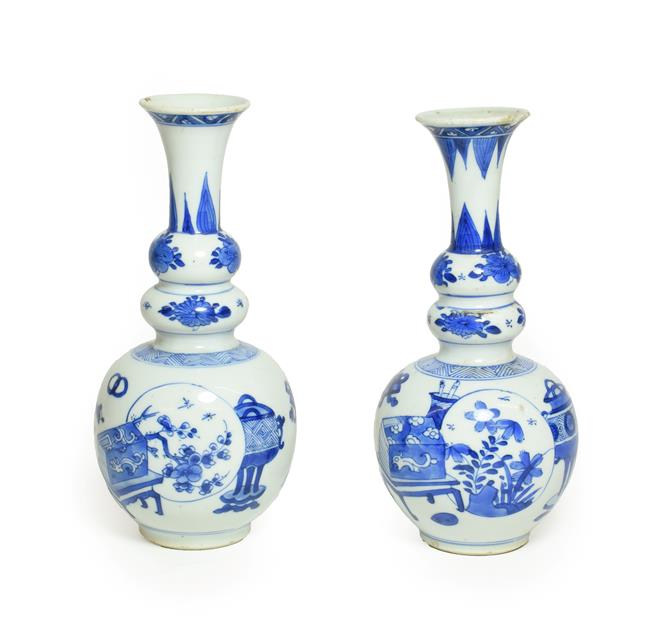 Lot 57 - A Matched Pair of Chinese Porcelain Double Gourd Vases, Kangxi, with trumpet necks, painted in...