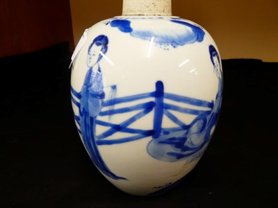 Lot 60 - A Chinese Porcelain Jar, Kangxi, of ovoid form, painted in underglaze blue with maidens in a fenced