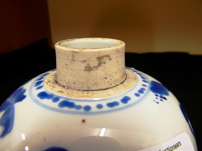 Lot 60 - A Chinese Porcelain Jar, Kangxi, of ovoid form, painted in underglaze blue with maidens in a fenced