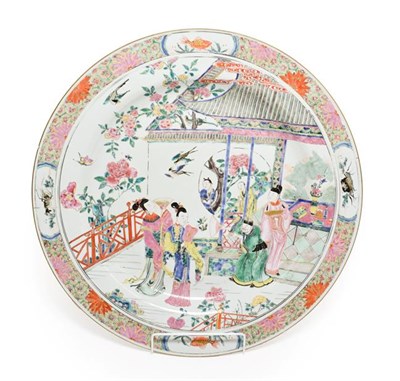 Lot 63 - A Chinese Porcelain Charger, Yongzheng, painted in famille rose enamels with figures in a...