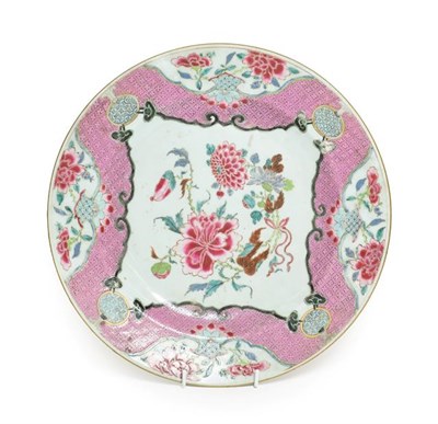 Lot 64 - A Chinese Porcelain Charger, Qianlong, painted in famille rose enamels with a spray of flowers in a