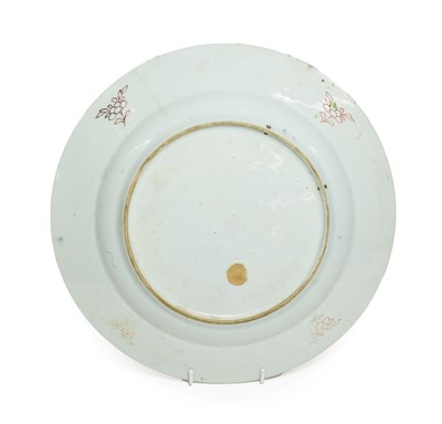 Lot 64 - A Chinese Porcelain Charger, Qianlong, painted in famille rose enamels with a spray of flowers in a