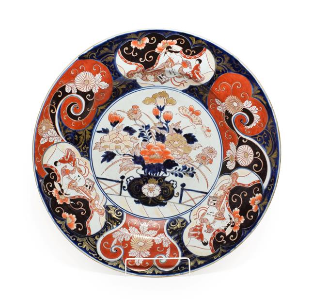 Lot 65 - An Imari Porcelain Charger, late 17th century, typically painted with a jardiniere of flowers...