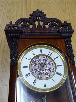 Lot 81 - A Rosewood Vienna Wall Timepiece, circa 1850, scroll pierced pediment, glazed front and side...