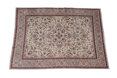 Lot 99 - Tabriz Carpet Central Iran, circa 1960 The cream field of curvilinear floral vines enclosed by pale