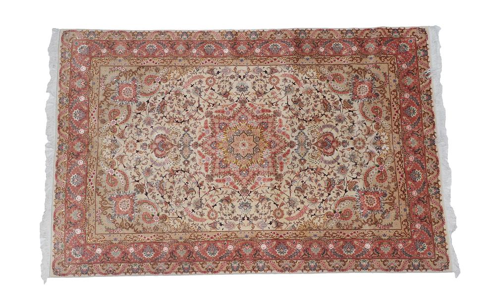 Lot 100 - Tabriz Part Silk Carpet North West Iran, modern The ivory field of curvilinear vines centred by...