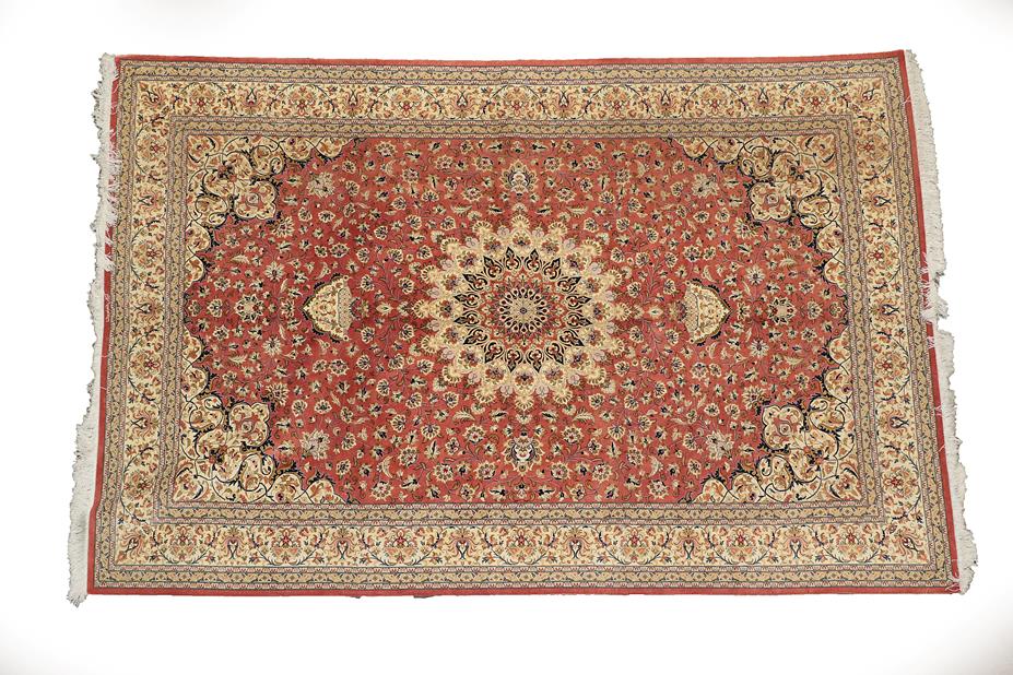 Lot 124 - Good Ghom Silk Carpet Central Iran, circa 1980 The brick red of vines around a flower head...