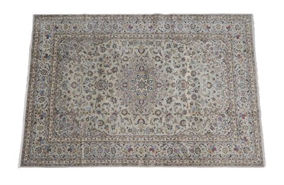 Lot 127 - Kashan Carpet Central Iran, circa 1970 The pale celadon field of scrolling vines around a medallion