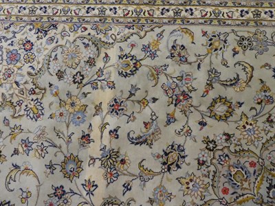 Lot 127 - Kashan Carpet Central Iran, circa 1970 The pale celadon field of scrolling vines around a medallion