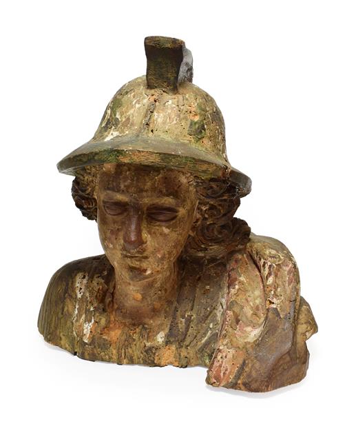 Lot 131 - An Italian Carved and Polychrome Wooden Bust of a Soldier, 16th/17th century, wearing a helmet...