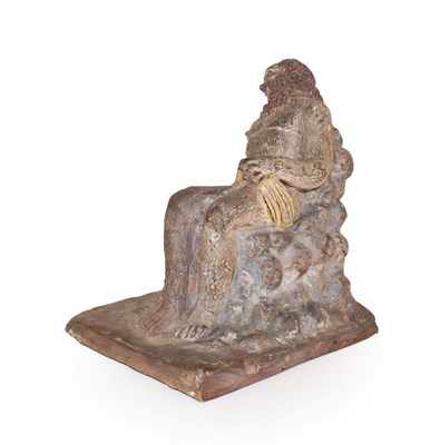 Lot 132 - After the Antique: A Terracotta Figure of Silenus, sitting on a rocky seat, a twin-handled cup...