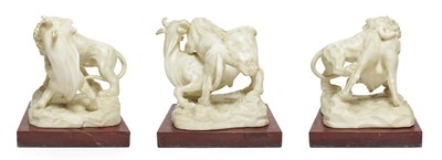 Lot 133 - After Giambologna: A Marble Group of a Lion Attacking a Bull, on a rouge marble base, 22cm wide See