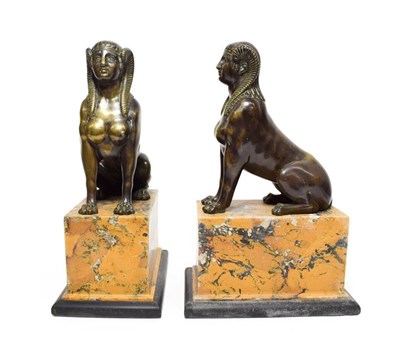 Lot 146 - A Pair of Bronze Sphinx, in Empire style, sitting upright, on later scagliola bases, 35.5cm...
