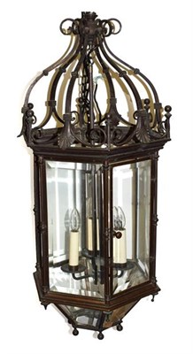 Lot 149 - A Patinated Metal Hall Lantern, 19th century, of hexagonal form with scrollwork superstructure, the