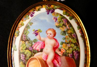 Lot 151 - An Enamel Plaque, probably South Staffordshire, circa 1780, of oval form, painted with a cherub...