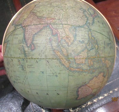 Lot 156 - A Crutchley's 12'' Terrestrial Globe, circa 1865, with covered engraved gores, calibrated brass...