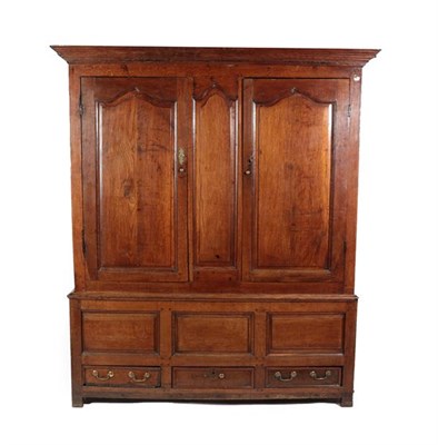 Lot 160 - A George III Joined Oak Cupboard, the moulded cornice above three fielded panels and two...