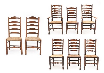 Lot 165 - A Set of Six Mid 19th Century Ash and Rush-Seated Ladderback Chairs, including two carvers, the...